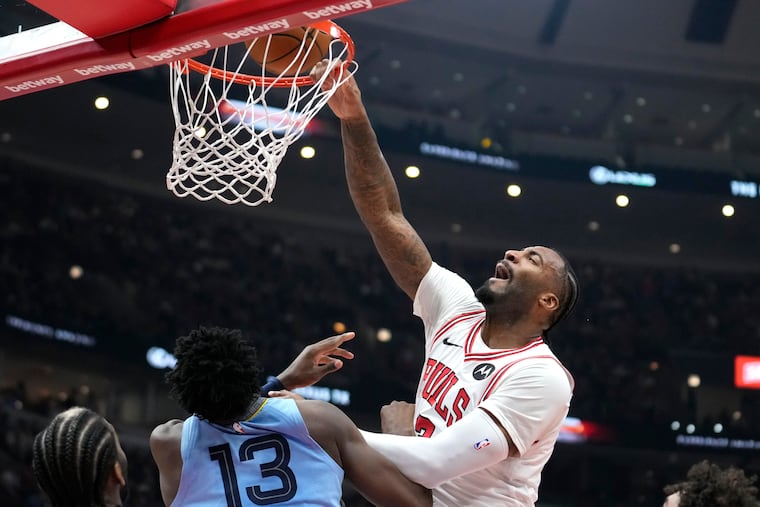 Chicago Bulls' Andre Drummond misses a dunk over Memphis Grizzlies' Jaren Jackson Jr. during the first half on Jan. 20.