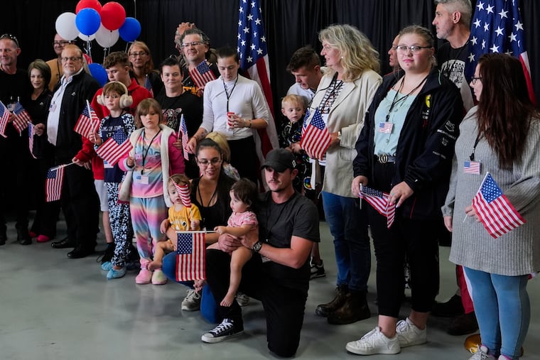 Afrikaner refugees from South Africa arrive Monday at Dulles International Airport in Dulles, Va.