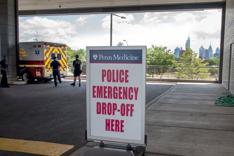 A sign is posted outside Penn Presbyterian Medical Center Level 1 Trauma Center at 38th & Powelton June 24, 2018.