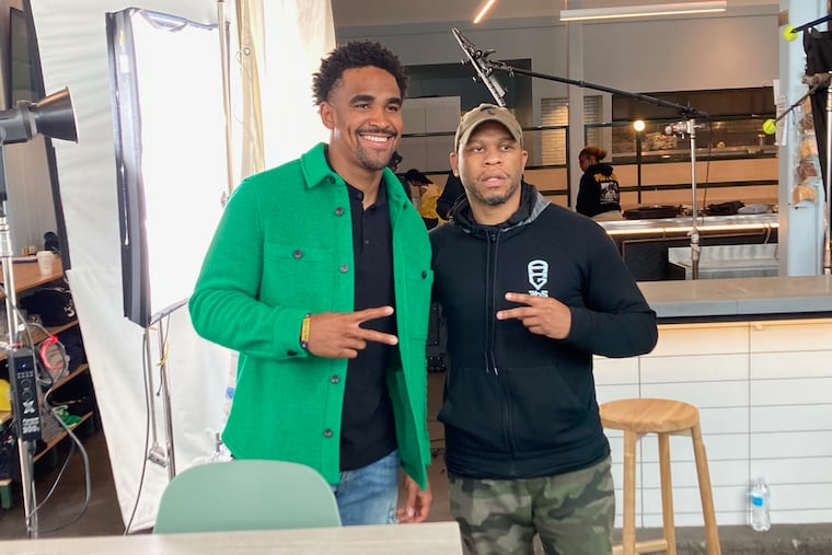 Eagles quarterback Jalen Hurts (left) with Ravens cornerback and fellow Alabama product Marlon Humphrey, who produced "Nothing But A Winner."