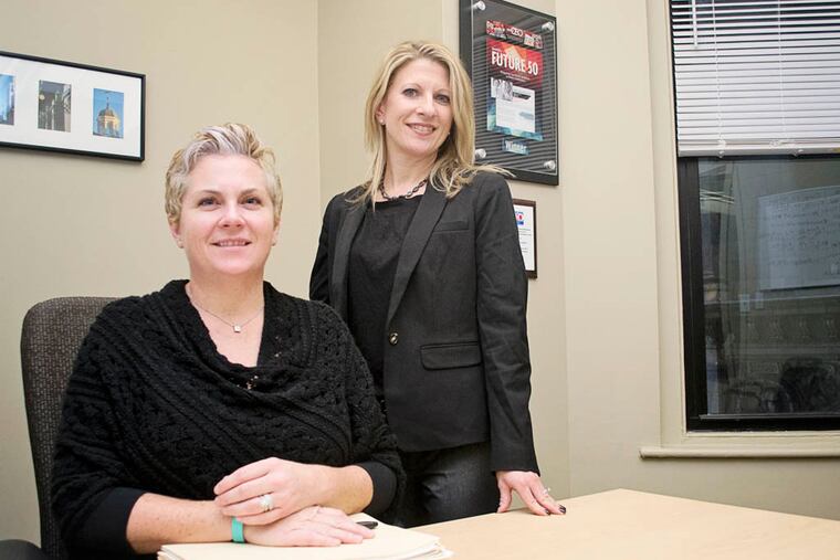Mikal Harden and Vicki Sack, co-founders of Juno Search Partners, a Center City firm that specializes in placement services. (Randi Fair/Staff Photographer)