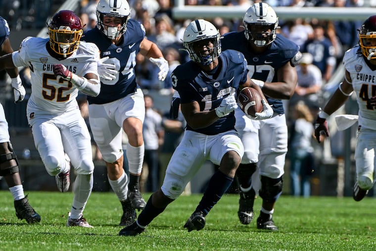 Penn State running back Kaytron Allen (13) breaks away from Central Michigan linebacker Dakota Cochran (52) during the Nittany Lions' eventual 33-14 win.