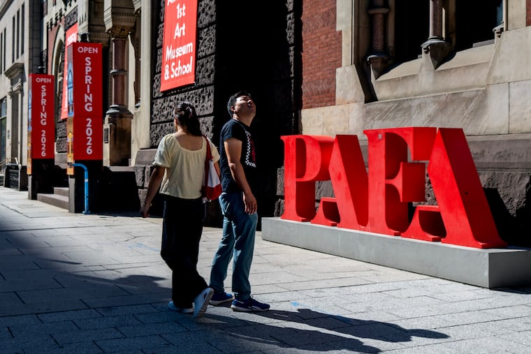 The Pennsylvania Academy of the Fine Arts' Furness-Hewitt building on North Broad Street, with banners announcing the building's reopening in spring 2026.