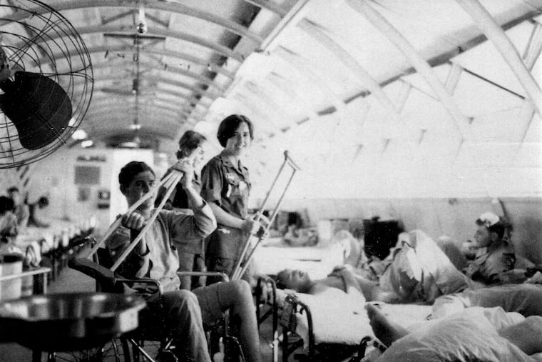 An undated photo provided by the Carlson Evans family shows Diane Carlson Evans in the center. Diane Carlson Evans, who experienced the horrors of the Vietnam War firsthand as an Army nurse, then led a successful decade-long campaign to establish a monument on the National Mall to the thousands of women who served in that conflict.
