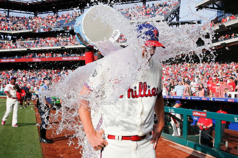 Phillies pitcher Nick Pivetta receives the sports drink bath after throwing a complete one run game beating the Cincinnati Reds 4-1 on Saturday, June 8, 2019 in Philadelphia.