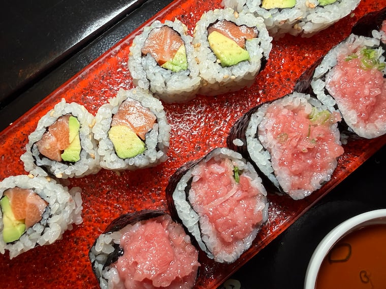 The salmon and avocado roll (top) and a YKI Toro Scallion (Futomaki Style) roll from Yanaga Kappo Izakaya, 637 N. Third St.