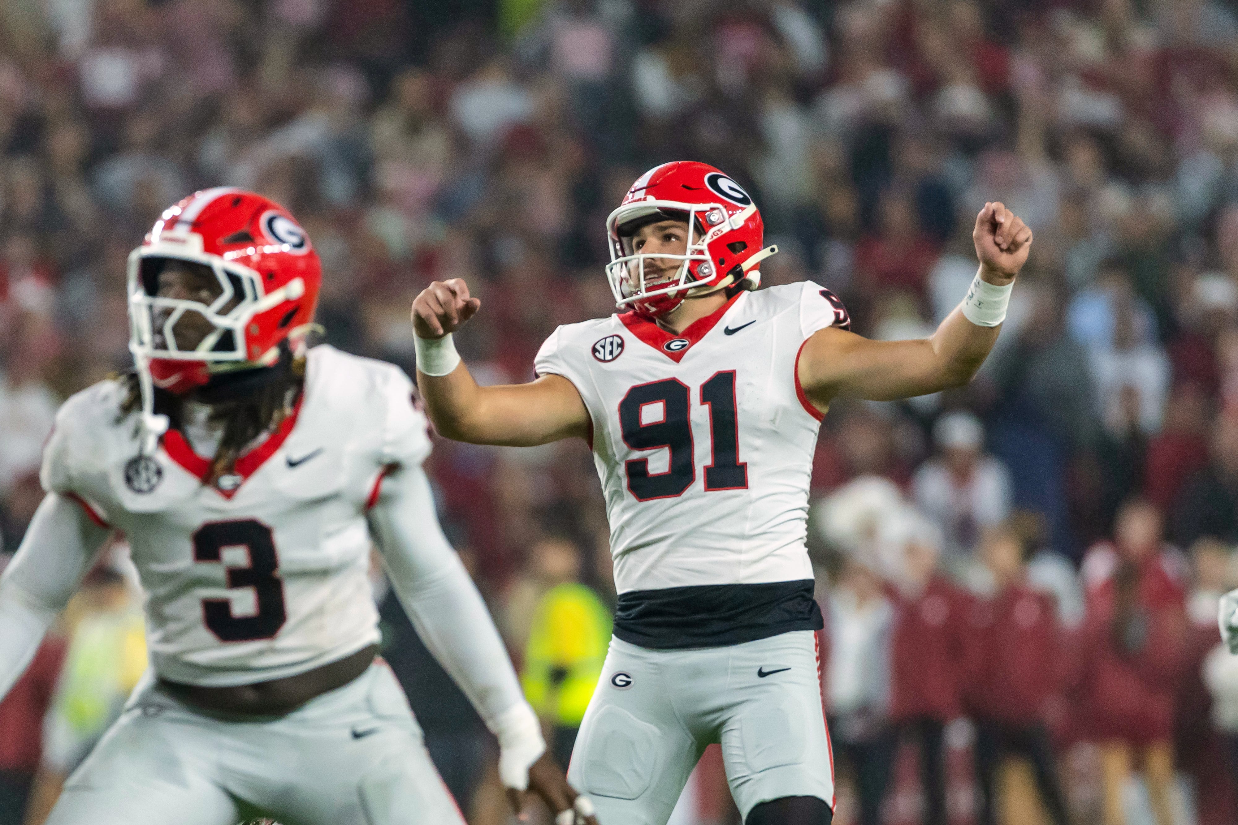 Dwight Phillips Jr. and No. 2 Georgia run past No. 6 Alabama 20-17 in an SEC clash