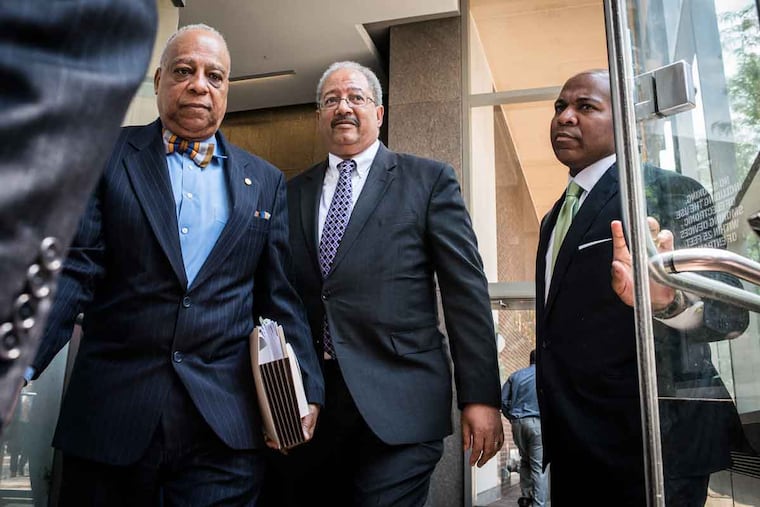 U.S. Rep. Chaka Fattah (center) leaves the federal courthouse after being convicted Tuesday, June 21, 2016, in a federal racketeering case.