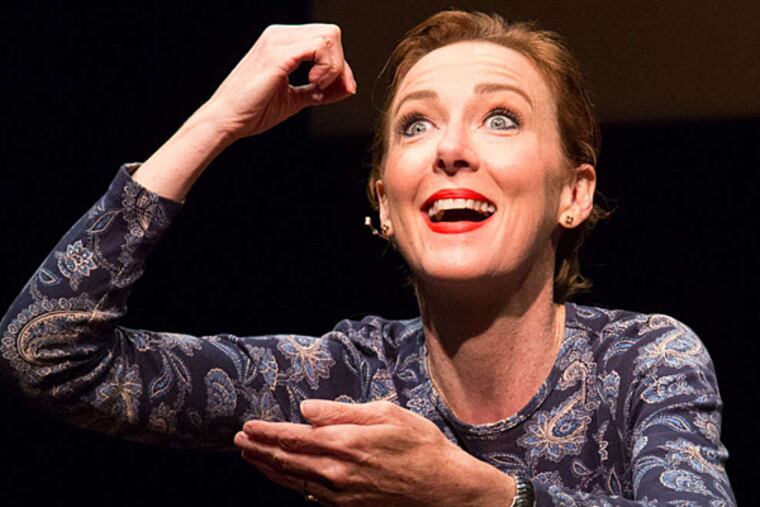 Singer-songwriter Jonatha Brooke performs a scene from her show, "My Mother Has 4 Noses."