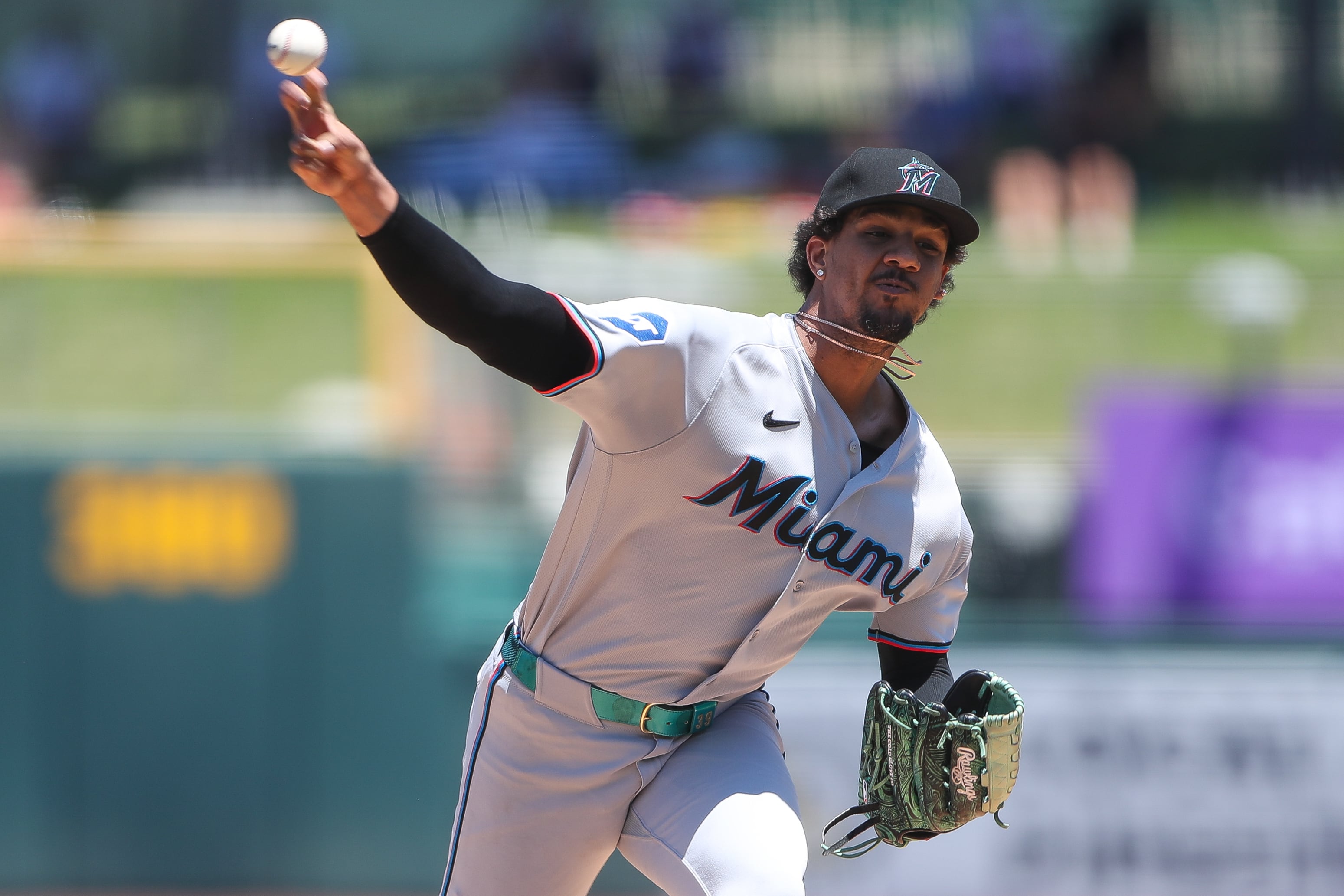 Marlins' Pérez dominates through seven perfect innings, Miami survives late A's rally for 9-8 win