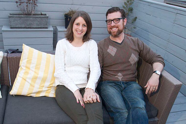 Lindsay Wilde and Jordan Hyatt sit on their rooftop deck, above the once-leaky roof that led them on a strange journey through the underbelly of Philly contracting.