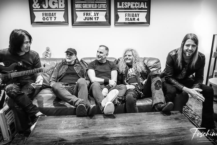 The members of Heavens Edge (L-R): guitarist Reggie Wu, guitarist Steve Parry, drummer Dave Rath, singer Mark Evans, and bassist Jaron Gulino