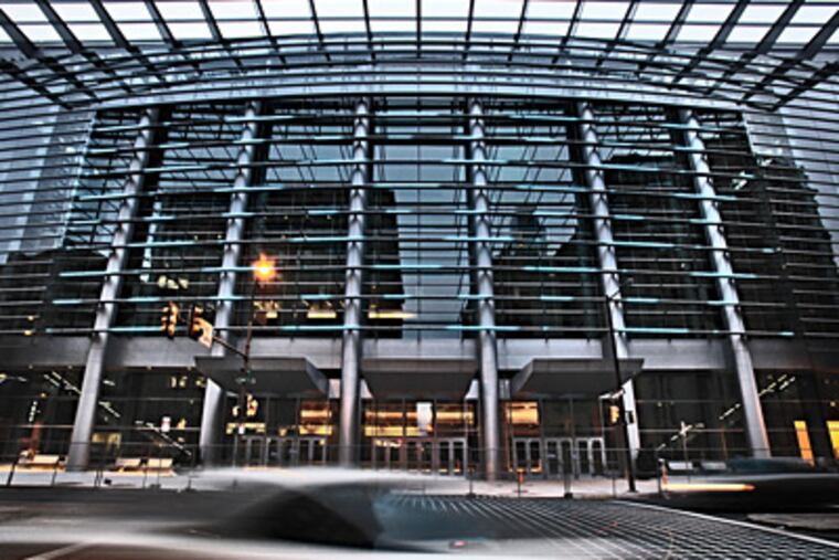 LED lighting display on the Broad Street glass facade of the Pennsylvania Convention Center expansion. ( David M Warren / Staff Photographer )