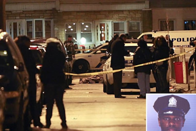 Police cordon off the 4400 block of N. Marshall Street, where off-duty police officer Martin Campbell (inset) and his friend were shot earlier tonight. (Steven M. Falk / Staff Photographer)