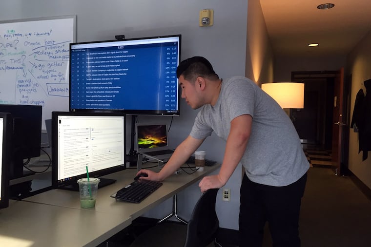 Drexel student Zunteng Lin reviews a story on his work station in the purpose-built app curation lab at Drexel’s LeBow College of Business.
