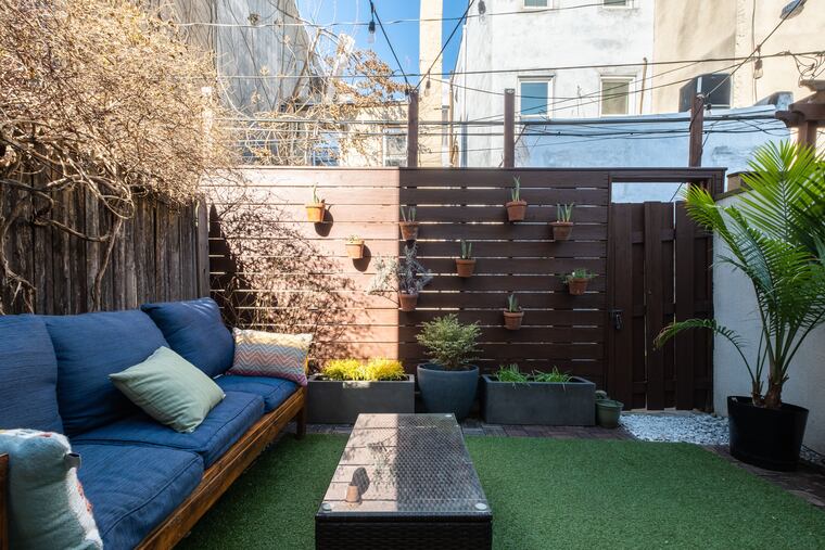 The fenced-in patio is right off the kitchen.
