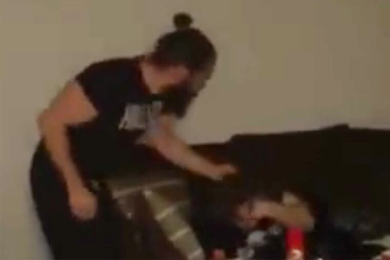 Paul A. Cojocaru, seen on video punching and dragging a teenager in a West Deptford home, has been charged, police said Monday.