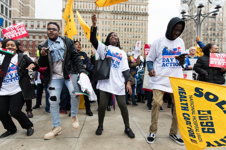 Attendees dance in Thomas Paine Plaza at the Working People's Day of Action labor rally in February.