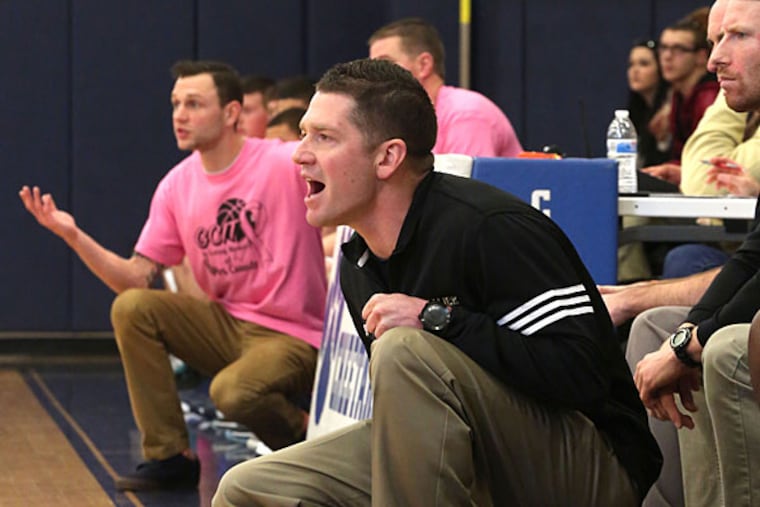 Eric Cassidy ( R ) of Schalick coaches against is his brother Josh
Cassidy of GCIT at Gloucester Institute of Technology, Sewell N.J.
Saturday January 10, 2015. (David Swanson/Staff Photographer )
