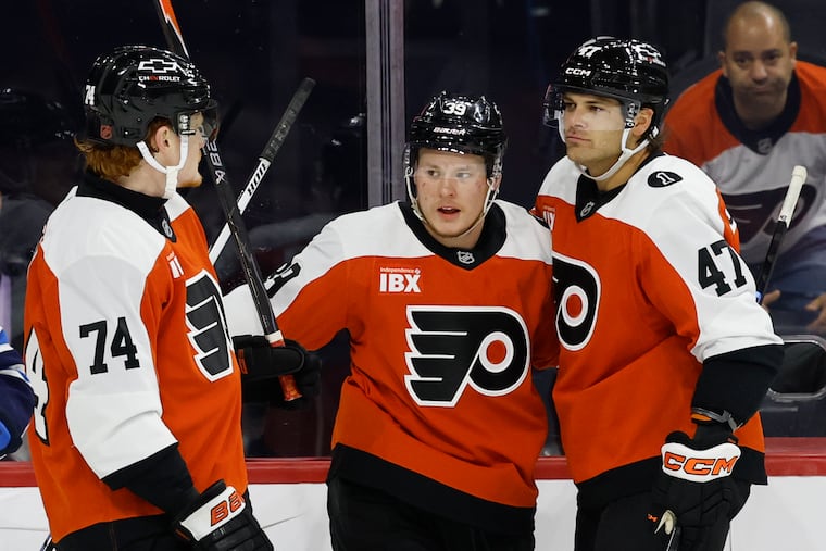 Flyers right wing Matvei Michkov celebrates his first goal of the season late in Thursday night's game.
