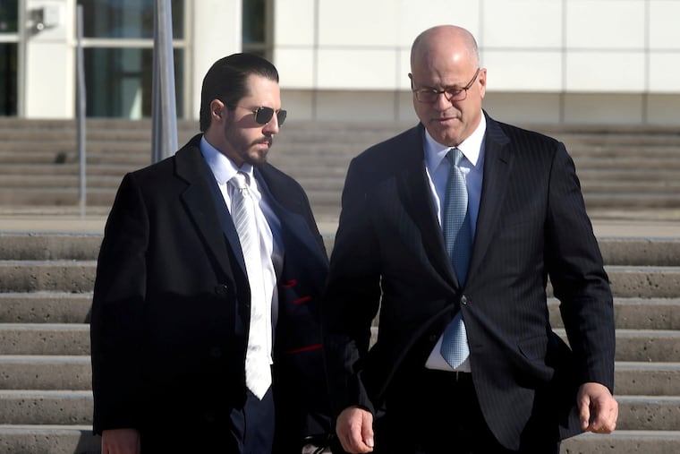 Samuel Miele, left, leaves Federal Court in Central Islip, N.Y., with his lawyer, Kevin Marino, on Tuesday, Nov 14, 2023. Miele, a former fundraiser for U.S. Rep. George Santos, pleaded guilty to a federal wire fraud charge. (John Roca/Newsday via AP)