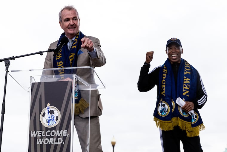 New Jersey Gov. Phil Murph, left, joined by New York Mayor Eric Adams speaks during a 2026 FIFA World Cup host city selection watch party at Liberty State Park in Jersey City, N.J., in 2022.
