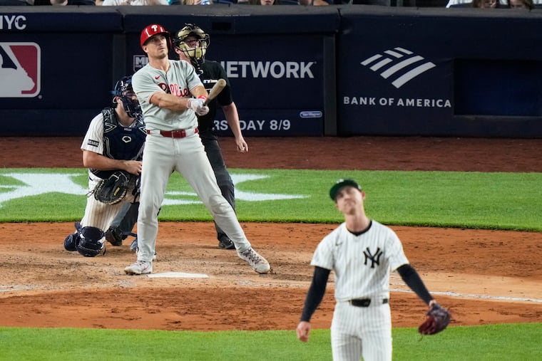Phillies catcher J.T. Realmuto hit the go-ahead three-run homer against the Yankees in the seventh inning.