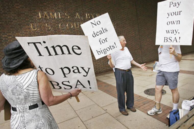 Members of the Freethought Society gather Monday to protest the policy of the Boy Scouts of America that excludes gays from membership. (Alejandro A. Alvarez / Staff Photographer)