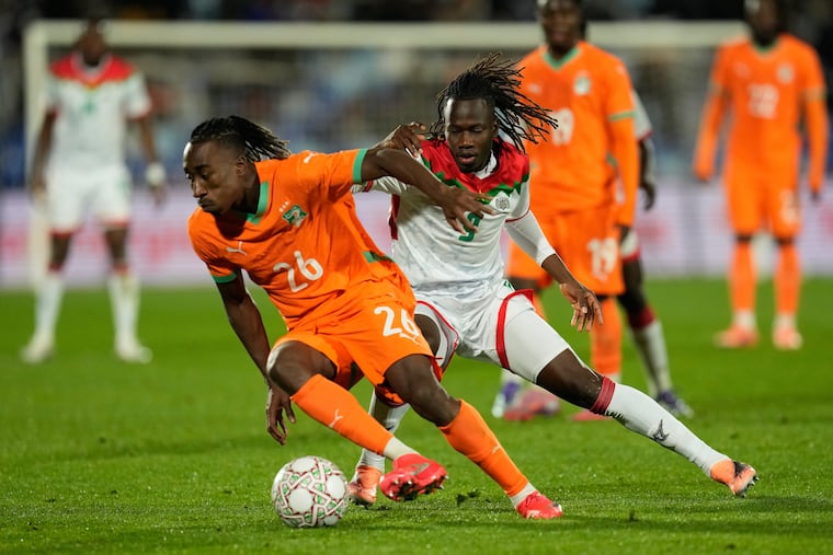 Yan Diomande (left) on the ball for Ivory Coast during an Africa Cup of Nations game in January.