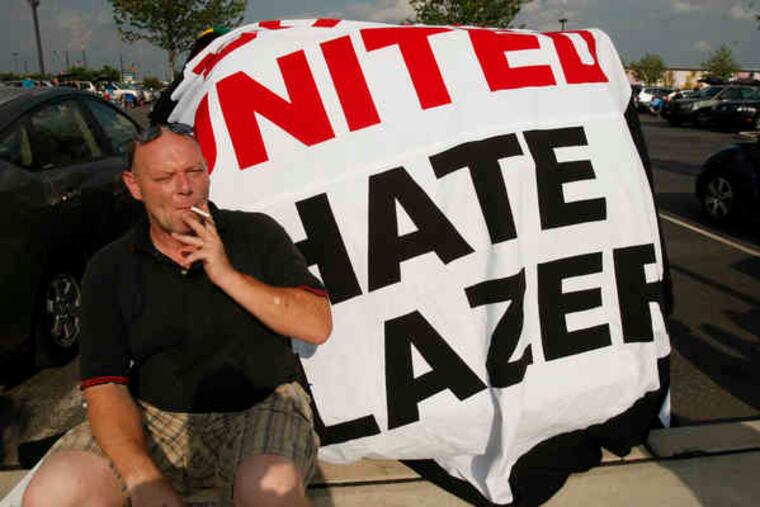 Andrew Burton, an English native living in Virginia and a Manchester United fan, is no fan of the team's U.S. owners.