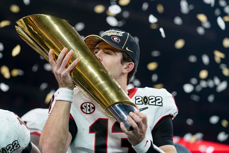 Georgia's Stetson Bennett celebrates after the College Football Playoff title game against Alabama.