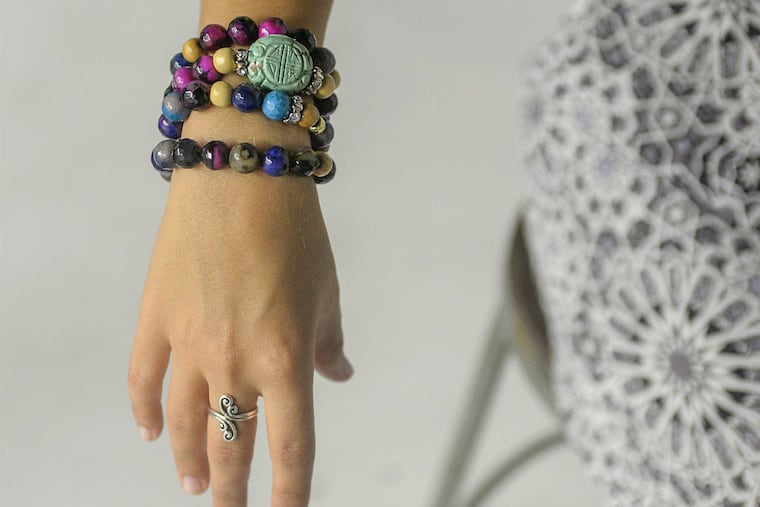Glitz on the wrist: "I got you" mala bracelet, also from Haute Mama Mala, available on hautemamamala.com.