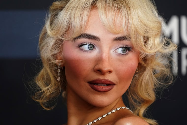 FILE - Sabrina Carpenter arrives at the 67th annual Grammy Awards on Feb. 2, 2025, in Los Angeles. (Photo by Jordan Strauss/Invision/AP, File)