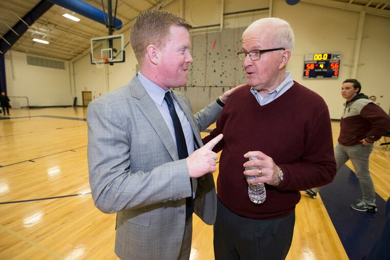 Speedy Morris (right) chatted with Girard College coach Bobby Jordan after their game in 2018. That was a typical scene for Morris, renowned in Philadelphia basketball circles for his willingness to help other coaches.