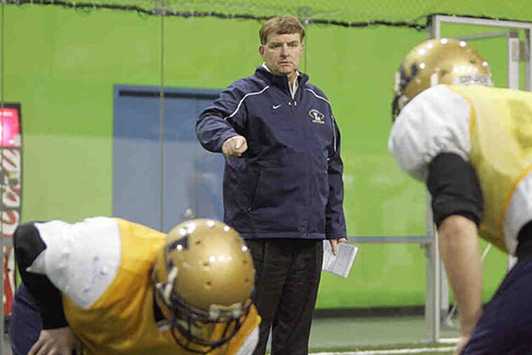 A longtime defensive coordinator at La Salle, John Steinmetz is now the school's head football coach. He is a member of La Salle's Class of 1977.