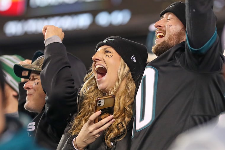 Eagles fans celebrate a NFC championship win against the San Francisco 49ers at Lincoln Financial Field.