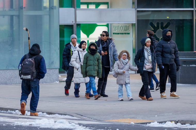 Ice melt from the remnant of that snow can be dangerous, and, yes, a pedestrial walking in Center City Monday was carrying a hockey stick.