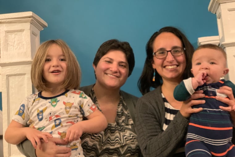 Alanna and Rebecca with children Bina (left) and Eitan.
.