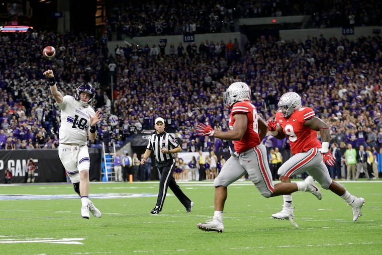Northwestern quarterback Clayton Thorson (18) throws during the second half of the Big Ten championship NCAA college football game against Ohio State, Saturday, Dec. 1, 2018, in Indianapolis. (AP Photo/AJ Mast)