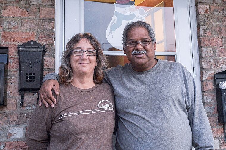 Peter Bowser and his fiancée, Cheryl Pew, outside their new apartment in Maple Shade. They obtained it through a new Camden County program after struggling with homelessness.