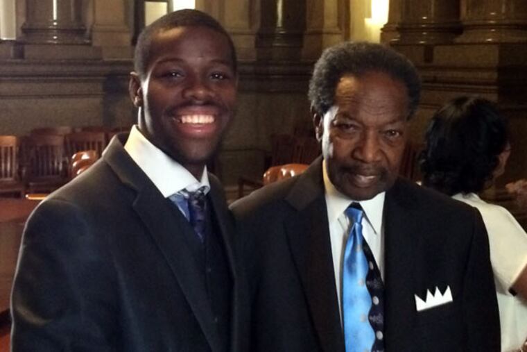 Kaleaf Wiggins and David Fattah urged fathers to walk their kids to school next week on the first day of classes. (MENSAH M. DEAN/DAILY NEWS STAFF)