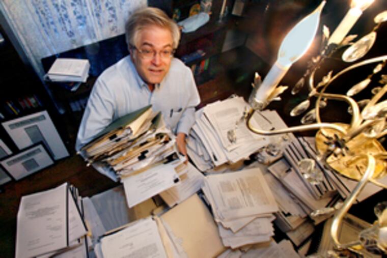Robert B. Sklaroff sits amid the paperwork he has amassed while challenging the merger that created Highmark Inc., and now, the proposed merger of Highmark and Independence Blue Cross. The internist and oncologist estimates he has spent $100,000 since 1995 on the battle.