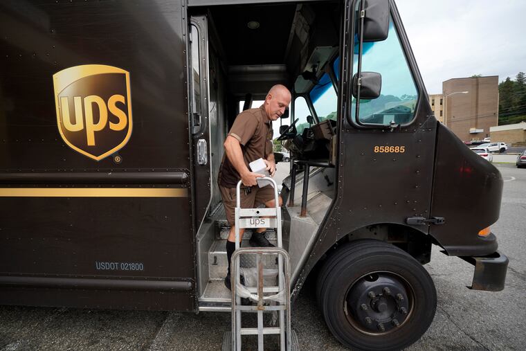 UPS driver Joe Speeler makes a delivery at the Leanon Shops in Mount Lebanon, Pa., on Tuesday, Sept. 21, 2021. United Parcel Service said Wednesday, Sept 7, 2022, it plans to hire more than 100,000 extra workers to help handle an increase in packages during the critical holiday season. That’s similar to the holiday seasons of 2021 and 2020.