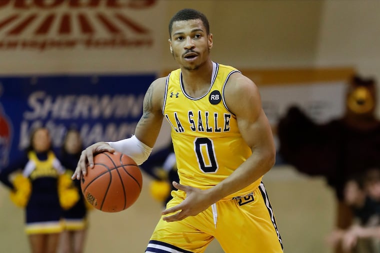 Guard Ayinde Hikim led the La Salle scorers.