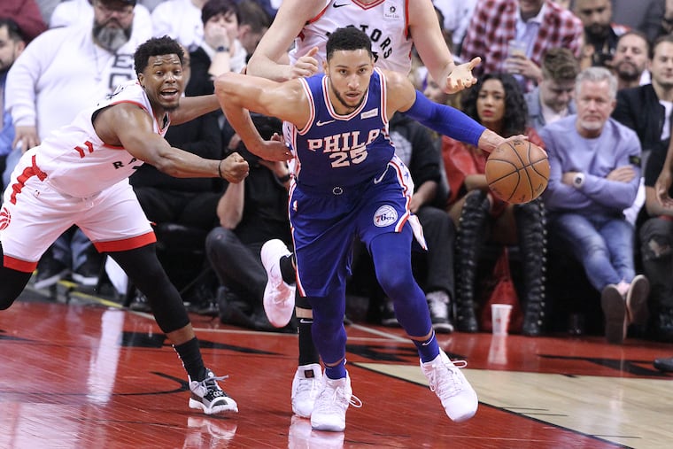Ben Simmons (right) and Kyle Lowry.