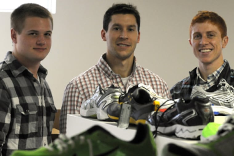 Bryan Leach, Matt Wilkinson and Nick End in the offices of Shoefitr. ( Darrell Sapp/Post-Gazette )