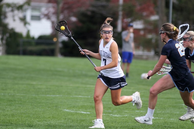 Hayden Posencheg in a high school lacrosse game. She has suffered five concussions.