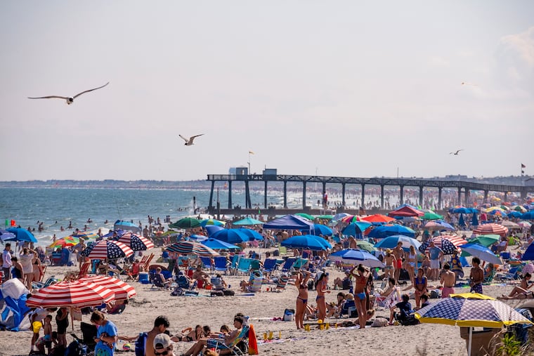 Beach goers packed the shoreline in Ocean City on July 4. Despite the coronavirus pandemic, the Fourth of July weekend brought large crowds to beaches and boardwalks along the South Jersey coast.