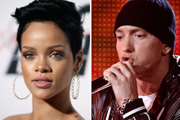 Singer Rihanna appears in Eminem's chart-topping "Love the Way You Lie," a song (and now a music video) that graphically depicts a physically abusive relationship. (AP Photo / Matt Sayles)