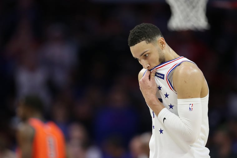 The Sixers' Ben Simmons (25) wipes his face during a game against the Oklahoma City Thunder at the Wells Fargo Center in South Philadelphia on Saturday, Jan. 19, 2019.